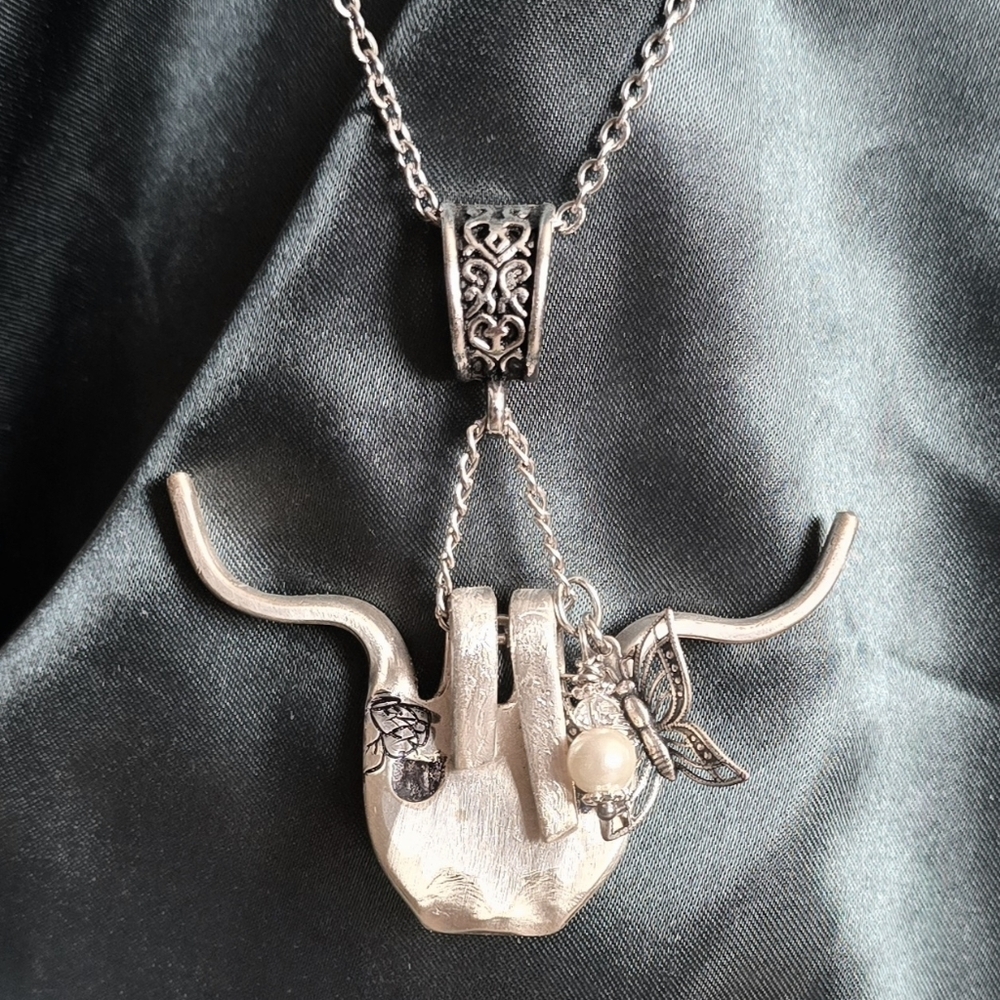 Cute highland cow made from a vintage silver fork